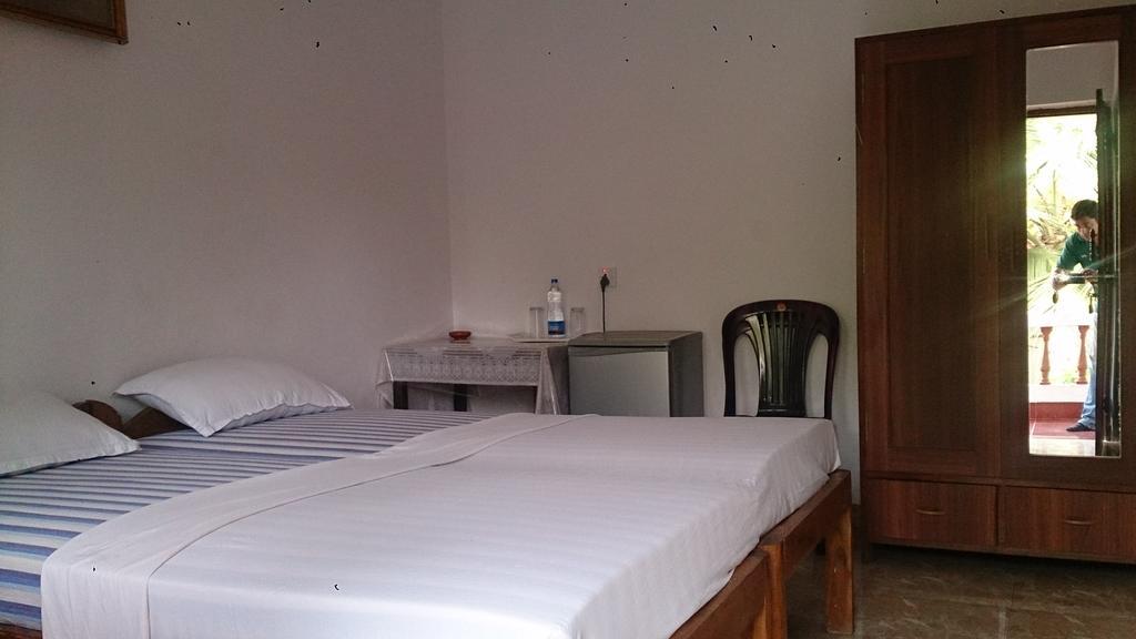 Domingos Guest House Baga Rum bild